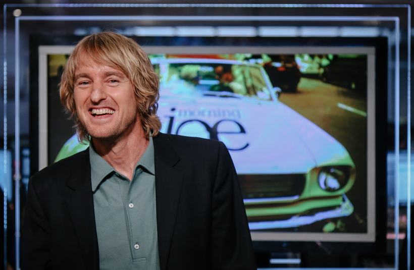 Owen Wilson laughing on the Morning Joe set.
